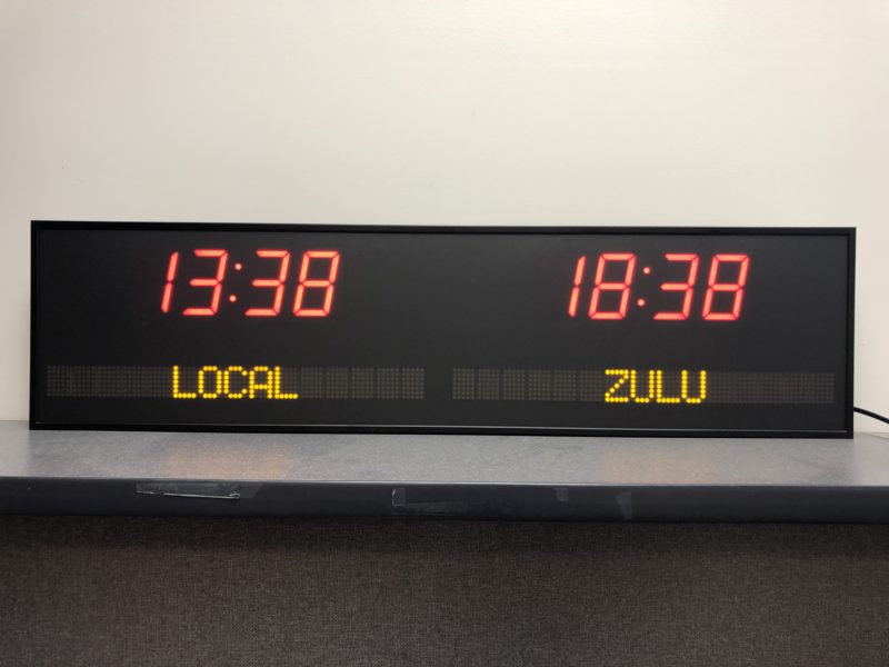 Local and Zulu time zone clock with electronic LED zone names